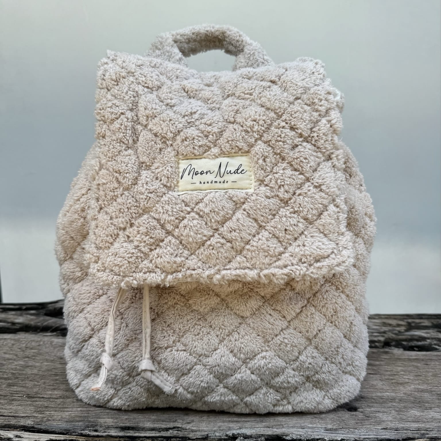 Moon Nude Teddy Flap Backpack